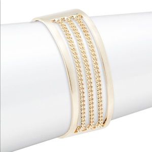 Cuff bracelet with chain accents